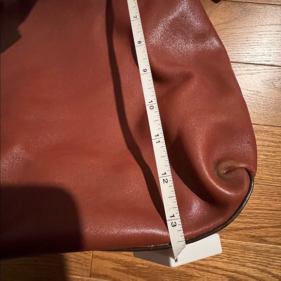 Saddle-color Coach Crossbody Bucket - Picture 12 of 14
